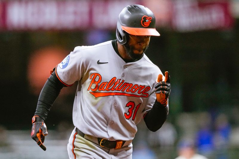 May 19, 2025; Milwaukee, Wisconsin, USA;  Baltimore Orioles center fielder Cedric Mullins (31) celebrates while rousing the bases after hitting a home run during the seventh inning against the Milwaukee Brewers at American Family Field. Mandatory Credit: Jeff Hanisch-Imagn Images