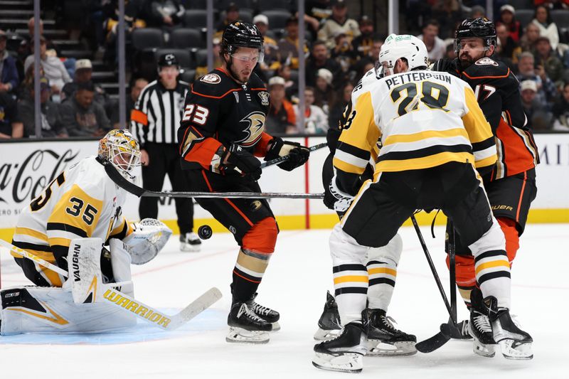 Nov 7, 2023; Anaheim, California, USA; Pittsburgh Penguins defenseman Marcus Pettersson (28) defends during the second period against the Anaheim Ducks at Honda Center. Mandatory Credit: Kiyoshi Mio-USA TODAY Sports