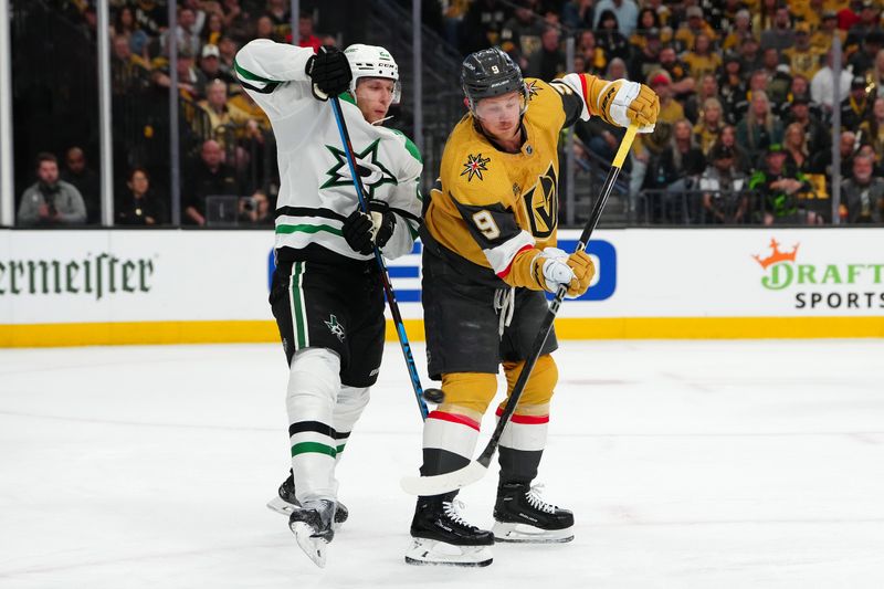 May 3, 2024; Las Vegas, Nevada, USA; Vegas Golden Knights center Jack Eichel (9) deflects the puck in front of Dallas Stars defenseman Esa Lindell (23) during the first period of game six of the first round of the 2024 Stanley Cup Playoffs at T-Mobile Arena. Mandatory Credit: Stephen R. Sylvanie-USA TODAY Sports