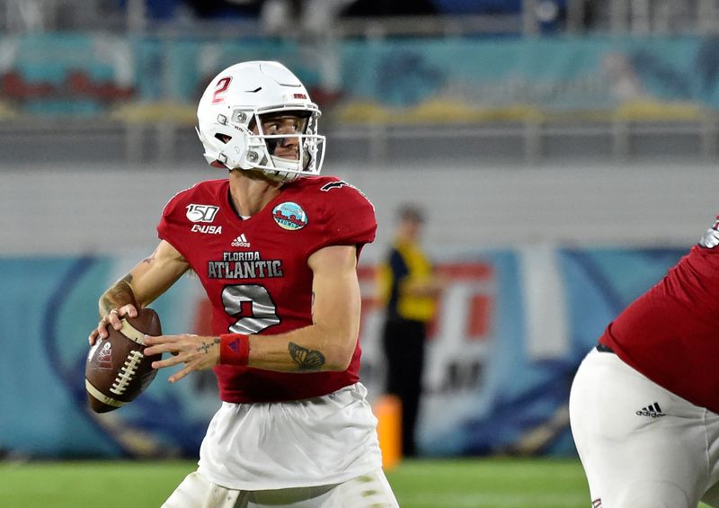 Dec 21, 2019; Boca Raton, Florida, USA; Florida Atlantic Owls quarterback Chris Robison (2) throws a pass against the Southern Methodist Mustangs in the second half during the Cheribundi Boca Raton Bowl at FAU Stadium. Mandatory Credit: Steve Mitchell-USA TODAY Sports