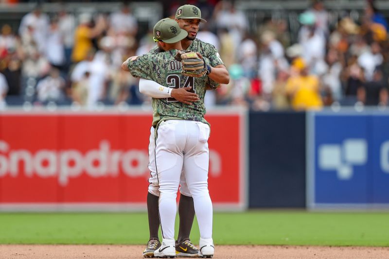 May 21, 2023; San Diego, California, USA;  San Diego Padres shortstop Xander Bogaerts (2) hugs San Diego Padres second baseman Rougned Odor (24) after the San Diego Padres defeat the Boston Red Sox at Petco Park. Mandatory Credit: David Frerker-USA TODAY Sports