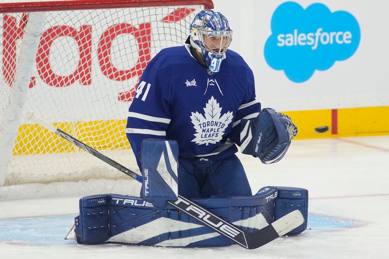 Oct 21, 2024; Toronto, Ontario, CAN; Toronto Maple Leafs goaltender Anthony Stolarz (41) makes a save during warm-up before a game against Tampa Bay Lightning at Scotiabank Arena. Mandatory Credit: John E. Sokolowski-Imagn Images