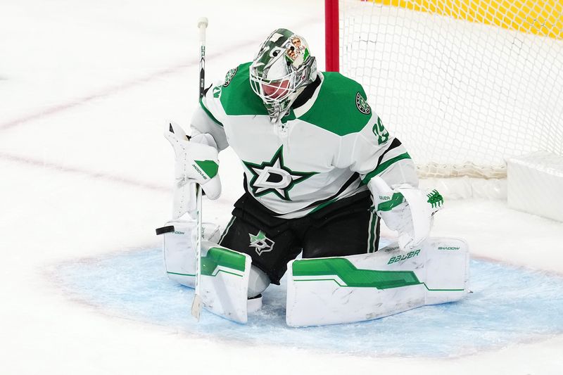 Jan 28, 2025; Las Vegas, Nevada, USA; Dallas Stars goaltender Jake Oettinger (29) makes a save against the Vegas Golden Knights during the third period at T-Mobile Arena. Mandatory Credit: Stephen R. Sylvanie-Imagn Images