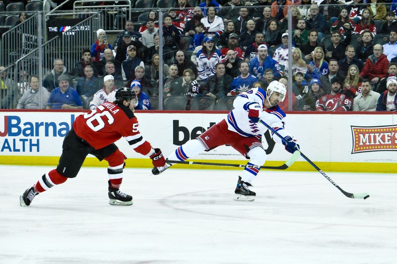 Feb 22, 2024; Newark, New Jersey, USA; New York Rangers left wing Chris Kreider (20) shoots the puck while being defended by New Jersey Devils left wing Erik Haula (56) during the first period at Prudential Center. Mandatory Credit: John Jones-USA TODAY Sports