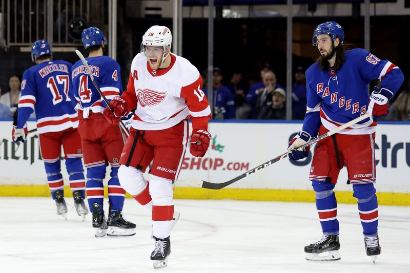 Nov 29, 2023; New York, New York, USA; Detroit Red Wings center Andrew Copp (18) celebrates a goal by center Robby Fabbri (not pictured) in front of New York Rangers right wing Blake Wheeler (17) and defenseman Braden Schneider (4) and center Mika Zibanejad (93) during the second period at Madison Square Garden. Mandatory Credit: Brad Penner-USA TODAY Sports