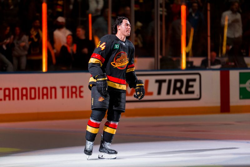Oct 9, 2025; Vancouver, British Columbia, CAN;  Vancouver Canucks forward Kiefer Sherwood (44) skates out as the game’s third star against the Calgary Flames at Rogers Arena. Mandatory Credit: Bob Frid-Imagn Images