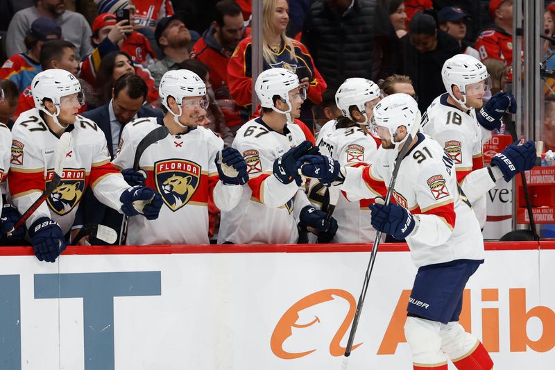 Nov 8, 2023; Washington, District of Columbia, USA; Florida Panthers defenseman Oliver Ekman-Larsson (91) celebrates with teammates after scoring a goal against the Washington Capitals in the first period at Capital One Arena. Mandatory Credit: Geoff Burke-USA TODAY Sports