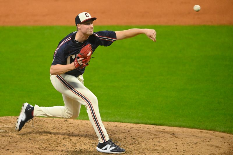 Jul 5, 2024; Cleveland, Ohio, USA; Cleveland Guardians relief pitcher Tim Herrin (29) delivers a pitch in the fifth inning against the San Francisco Giants at Progressive Field. Mandatory Credit: David Richard-USA TODAY Sports