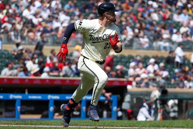 Apr 25, 2024; Minneapolis, Minnesota, USA; Minnesota Twins Ryan Jeffers (27) hits a solo home run against the Chicago White Sox during the sixth inning at Target Field. Mandatory Credit: Matt Krohn-USA TODAY Sports