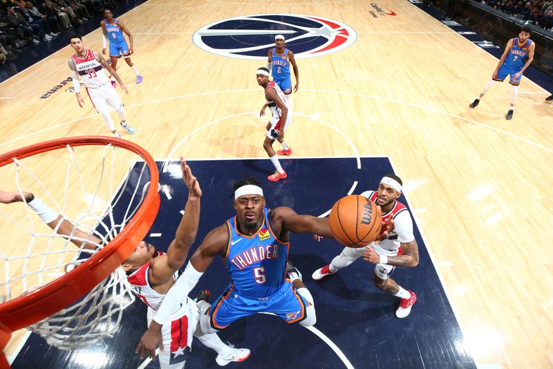 WASHINGTON, DC -? JANUARY 8: Luguentz Dort #5 of the Oklahoma City Thunder drives to the basket during the game against the Washington Wizards on January 8, 2024 at Capital One Arena in Washington, DC. NOTE TO USER: User expressly acknowledges and agrees that, by downloading and or using this Photograph, user is consenting to the terms and conditions of the Getty Images License Agreement. Mandatory Copyright Notice: Copyright 2024 NBAE (Photo by Stephen Gosling/NBAE via Getty Images)