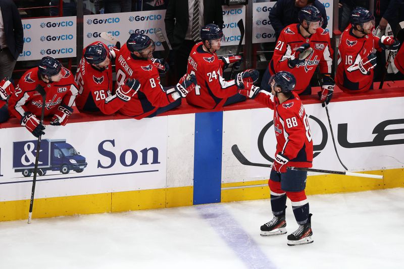 Mar 20, 2025; Washington, District of Columbia, USA; Washington Capitals left wing Andrew Mangiapane (88) celebrates with his teammates during the second period against the Philadelphia Flyers at Capital One Arena. Mandatory Credit: Daniel Kucin Jr.-Imagn Images