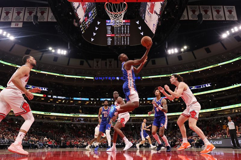 CHICAGO, ILLINOIS - DECEMBER 08: Tyrese Maxey #0 of the Philadelphia 76ers goes up for a layup against the Chicago Bulls during the second half at the United Center on December 08, 2024 in Chicago, Illinois. NOTE TO USER: User expressly acknowledges and agrees that, by downloading and or using this photograph, User is consenting to the terms and conditions of the Getty Images License Agreement.  (Photo by Michael Reaves/Getty Images)