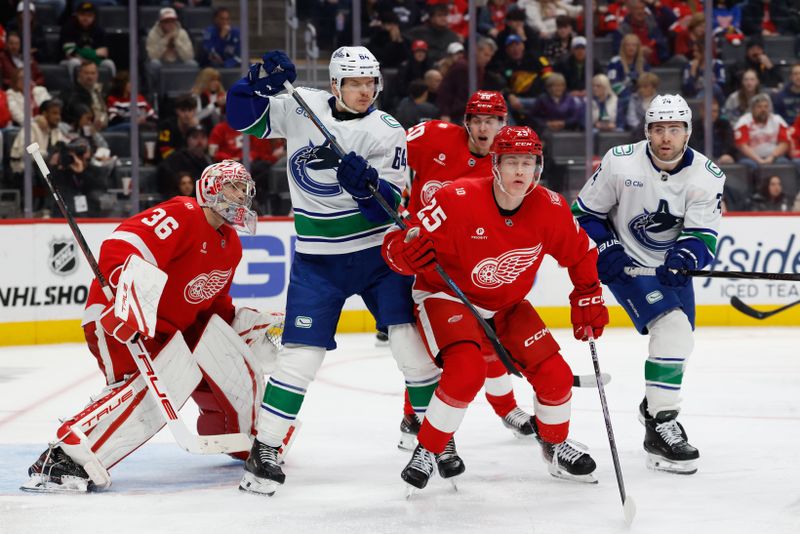 Jan 8, 2026; Detroit, Michigan, USA;  Vancouver Canucks center David Kampf (64) and Detroit Red Wings defenseman Jacob Bernard-Docker (25) fight for position in front of goaltender John Gibson (36) in the third period at Little Caesars Arena. Mandatory Credit: Rick Osentoski-Imagn Images