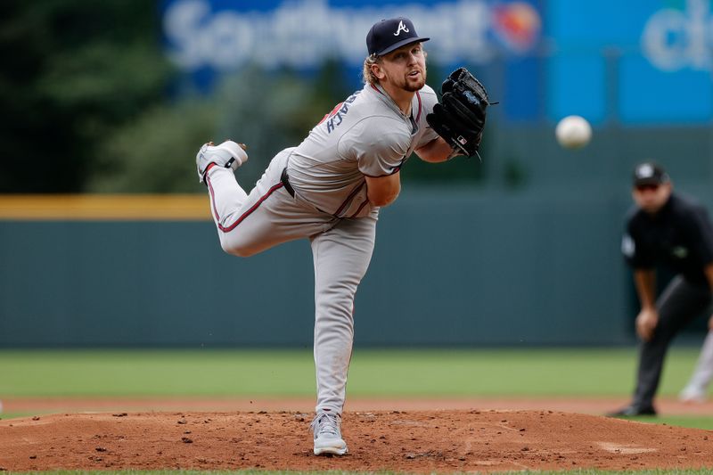 Aug 11, 2024; Denver, Colorado, USA; Atlanta Braves pitcher Spencer Schwellenbach (56) pitches in the first inning against the Colorado Rockies at Coors Field. Mandatory Credit: Isaiah J. Downing-USA TODAY Sports