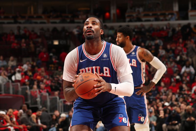 CHICAGO, IL - DECEMBER 8: Andre Drummond #5 of the Philadelphia 76ers shoots a free throw during the game against the Chicago Bulls on December 8, 2024 at United Center in Chicago, Illinois. NOTE TO USER: User expressly acknowledges and agrees that, by downloading and or using this photograph, User is consenting to the terms and conditions of the Getty Images License Agreement. Mandatory Copyright Notice: Copyright 2024 NBAE (Photo by Gary Dineen/NBAE via Getty Images)