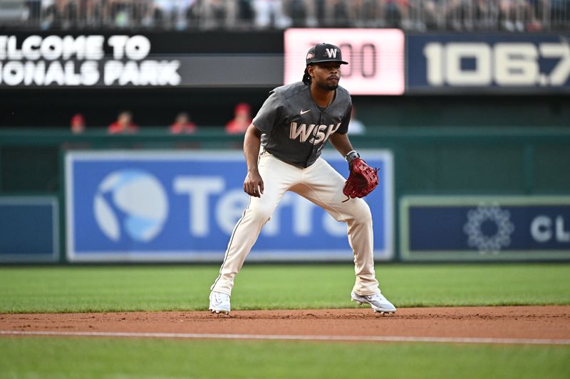 Aug 10, 2024; Washington, District of Columbia, USA;  Washington Nationals third baseman Jose Tena (8) looks toward the batter during the second inning against the Los Angeles Angels at Nationals Park. Mandatory Credit: James A. Pittman-USA TODAY Sports
