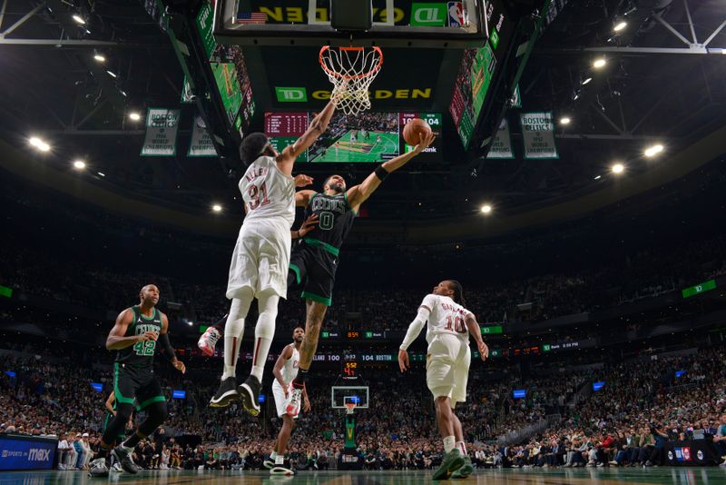 BOSTON, MA - NOVEMBER 19: Jayson Tatum #0 of the Boston Celtics drives to the basket during the game against the Cleveland Cavaliers during the Emirates NBA Cup game on November 19, 2024 at TD Garden in Boston, Massachusetts. NOTE TO USER: User expressly acknowledges and agrees that, by downloading and/or using this Photograph, user is consenting to the terms and conditions of the Getty Images License Agreement. Mandatory Copyright Notice: Copyright 2024 NBAE (Photo by Jesse D. Garrabrant/NBAE via Getty Images)