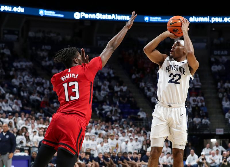 Feb 26, 2023; University Park, Pennsylvania, USA; Penn State Nittany Lions guard Jalen Pickett (22) shoots the ball as Rutgers Scarlet Knights forward Antwone Woolfolk (13) attempts to block during the first half at Bryce Jordan Center. Rutgers defeated Penn State 59-56. Mandatory Credit: Matthew OHaren-USA TODAY Sports