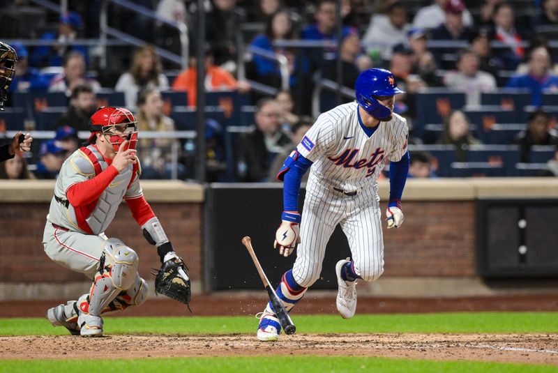 Apr 21, 2025; New York City, New York, USA; New York Mets outfielder Brandon Nimmo (9) hits a single against the Philadelphia Phillies during the sixth inning at Citi Field. Mandatory Credit: John Jones-Imagn Images