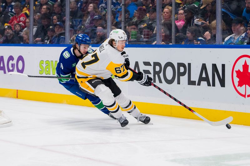 Feb 27, 2024; Vancouver, British Columbia, CAN; Vancouver Canucks defenseman Quinn Hughes (43) battles with Pittsburgh Penguins forward Rickard Rakell (67) in the second period at Rogers Arena. Mandatory Credit: Bob Frid-USA TODAY Sports