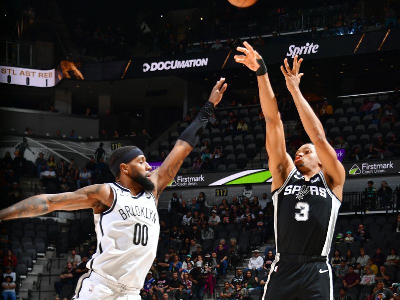 SAN ANTONIO, TX - JANUARY 17:  Keldon Johnson #3 of the San Antonio Spurs shoots a three point basket during the game against the Brooklyn Nets on January 17, 2023 at the AT&T Center in San Antonio, Texas. NOTE TO USER: User expressly acknowledges and agrees that, by downloading and or using this photograph, user is consenting to the terms and conditions of the Getty Images License Agreement. Mandatory Copyright Notice: Copyright 2022 NBAE (Photos by Michael Gonzales/NBAE via Getty Images)