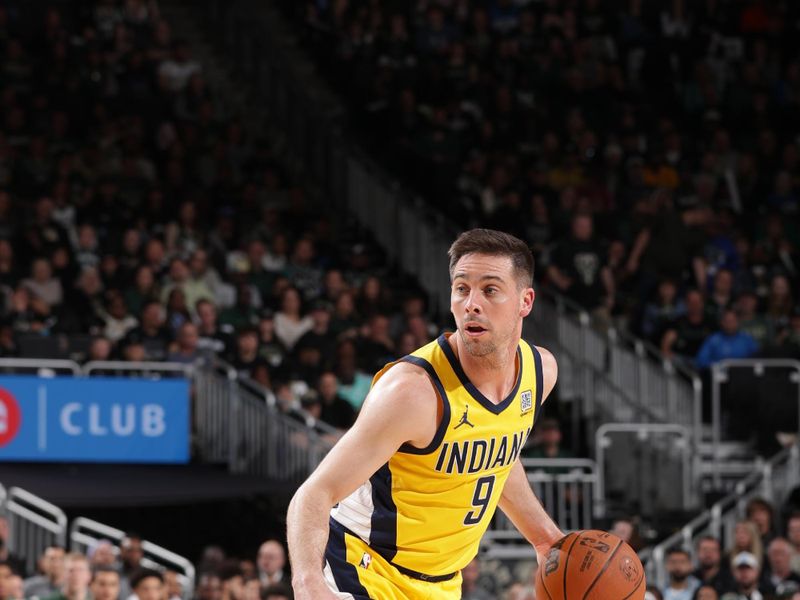 MILWAUKEE, WI - APRIL 27: T.J. McConnell #9 of the Indiana Pacers handles the ball during the game against the Milwaukee Bucks during Round One Game Four of the 2025 NBA Playoffs on April 27, 2025 at Fiserv Forum Center in Milwaukee, Wisconsin. NOTE TO USER: User expressly acknowledges and agrees that, by downloading and or using this Photograph, user is consenting to the terms and conditions of the Getty Images License Agreement. Mandatory Copyright Notice: Copyright 2025 NBAE (Photo by Gary Dineen/NBAE via Getty Images).