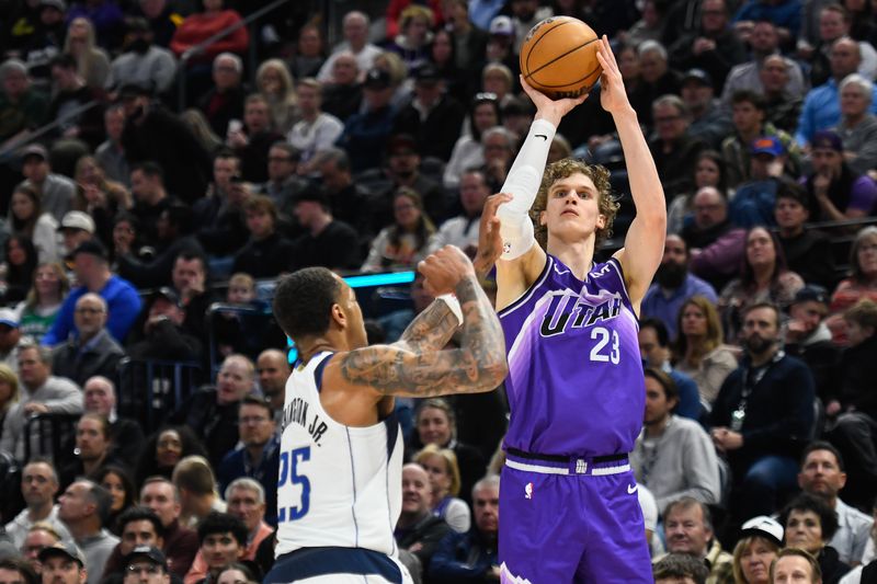 SALT LAKE CITY, UTAH - MARCH 25: Lauri Markkanen #23 of the Utah Jazz shoots over P.J. Washington #25 of the Dallas Mavericks during the first half of a game at Delta Center on March 25, 2024 in Salt Lake City, Utah. NOTE TO USER: User expressly acknowledges and agrees that, by downloading and or using this photograph, User is consenting to the terms and conditions of the Getty Images License Agreement. (Photo by Alex Goodlett/Getty Images)