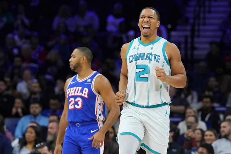 PHILADELPHIA, PENNSYLVANIA - NOVEMBER 10: Grant Williams #2 of the Charlotte Hornets reacts in front of Eric Gordon #23 of the Philadelphia 76ers in the first half at the Wells Fargo Center on November 10, 2024 in Philadelphia, Pennsylvania. NOTE TO USER: User expressly acknowledges and agrees that, by downloading and/or using this photograph, user is consenting to the terms and conditions of the Getty Images License Agreement. (Photo by Mitchell Leff/Getty Images)