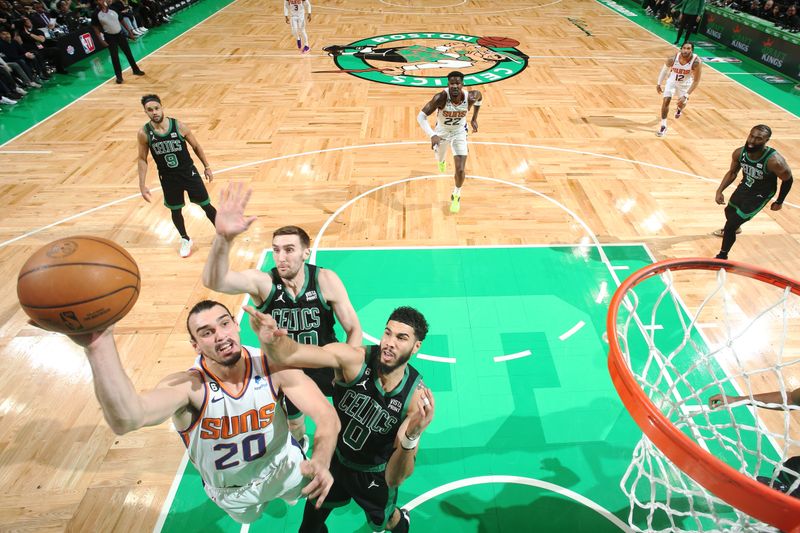 BOSTON, MA - FEBRUARY 3: Dario Saric #20 of the Phoenix Suns drives to the basket during the game against the Boston Celtics on February 3, 2023 at TD Garden in Boston, Massachusetts.  NOTE TO USER: User expressly acknowledges and agrees that, by downloading and or using this photograph, User is consenting to the terms and conditions of the Getty Images License Agreement. Mandatory Copyright Notice: Copyright 2022 NBAE  (Photo by Nathaniel S. Butler/NBAE via Getty Images)