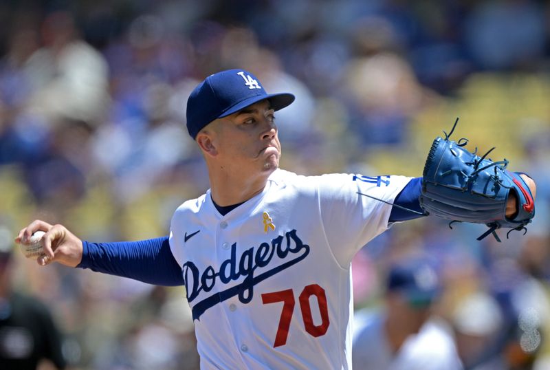 Sep 3, 2023; Los Angeles, California, USA;  Los Angeles Dodgers starting pitcher Bobby Miller (70) delivers to the plate in the first inning against the Atlanta Braves at Dodger Stadium. Mandatory Credit: Jayne Kamin-Oncea-USA TODAY Sports