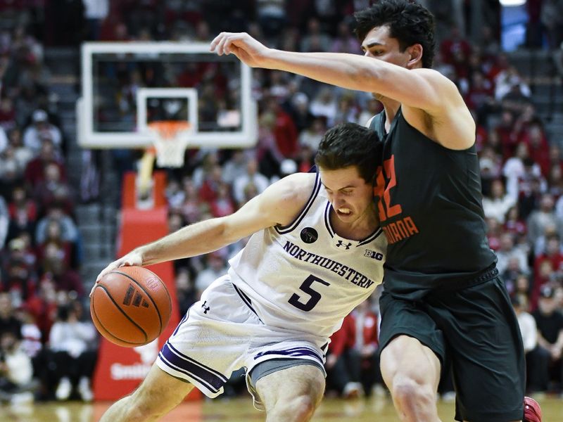 Feb 18, 2024; Bloomington, Indiana, USA;  Northwestern Wildcats guard Ryan Langborg (5) dribbles the ball against Indiana Hoosiers guard Trey Galloway (32) during the second half at Simon Skjodt Assembly Hall. Mandatory Credit: Robert Goddin-USA TODAY Sports