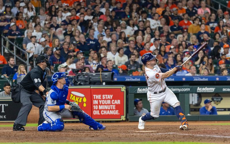 Sep 23, 2023; Houston, Texas, USA; Houston Astros left fielder Chas McCormick (20) hits a home run against the Kansas City Royals in the seventh inning at Minute Maid Park. Mandatory Credit: Thomas Shea-USA TODAY Sports