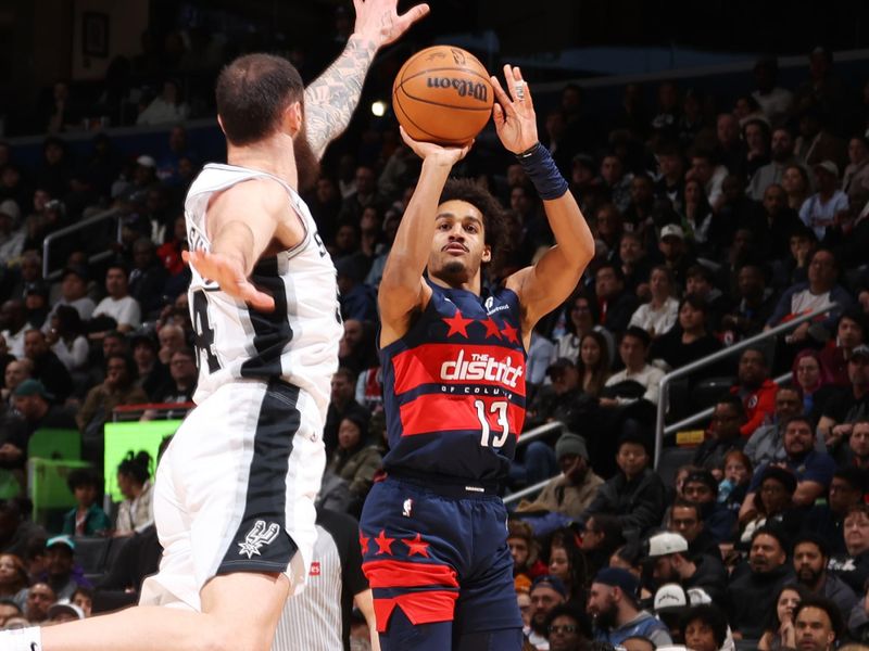 WASHINGTON, DC -? FEBRUARY 10: Jordan Poole #13 of the Washington Wizards shoots a three point basket during the game against the San Antonio Spurs on February 10, 2025 at Capital One Arena in Washington, DC. NOTE TO USER: User expressly acknowledges and agrees that, by downloading and or using this Photograph, user is consenting to the terms and conditions of the Getty Images License Agreement. Mandatory Copyright Notice: Copyright 2025 NBAE (Photo by Kenny Giarla/NBAE via Getty Images)