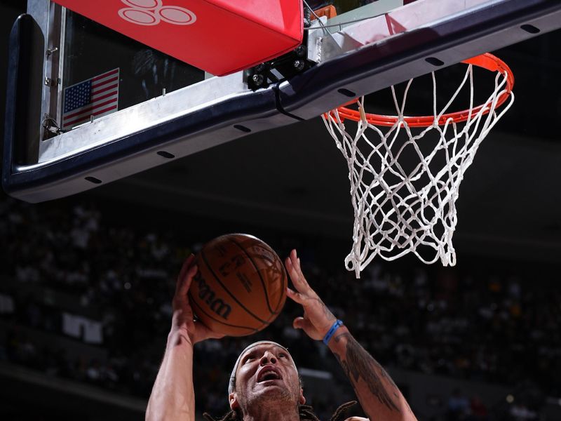 DENVER, CO - APRIL 20: Aaron Gordon #50 of the Denver Nuggets drives to the basket during the game against the Los Angeles Lakers during Round 1 Game 1 of the 2024 NBA Playoffs on April 20, 2024 at the Ball Arena in Denver, Colorado. NOTE TO USER: User expressly acknowledges and agrees that, by downloading and/or using this Photograph, user is consenting to the terms and conditions of the Getty Images License Agreement. Mandatory Copyright Notice: Copyright 2024 NBAE (Photo by Garrett Ellwood/NBAE via Getty Images)