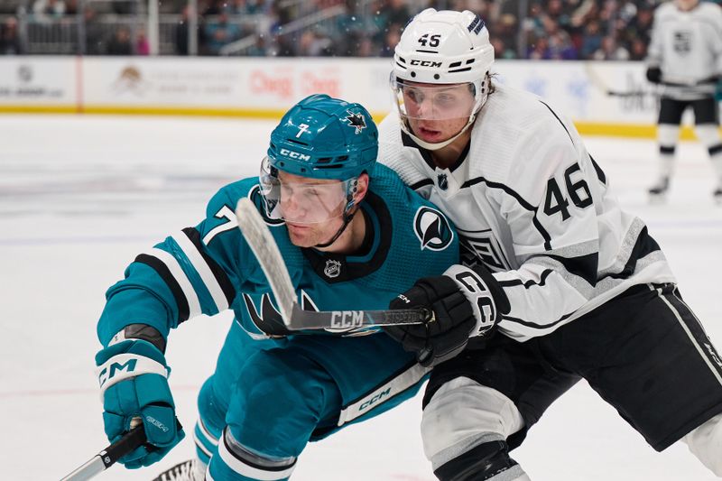 Apr 4, 2024; San Jose, California, USA; San Jose Sharks center Nico Sturm (7) vies for the puck against Los Angeles Kings center Blake Lizotte (46) during the third period at SAP Center at San Jose. Mandatory Credit: Robert Edwards-USA TODAY Sports