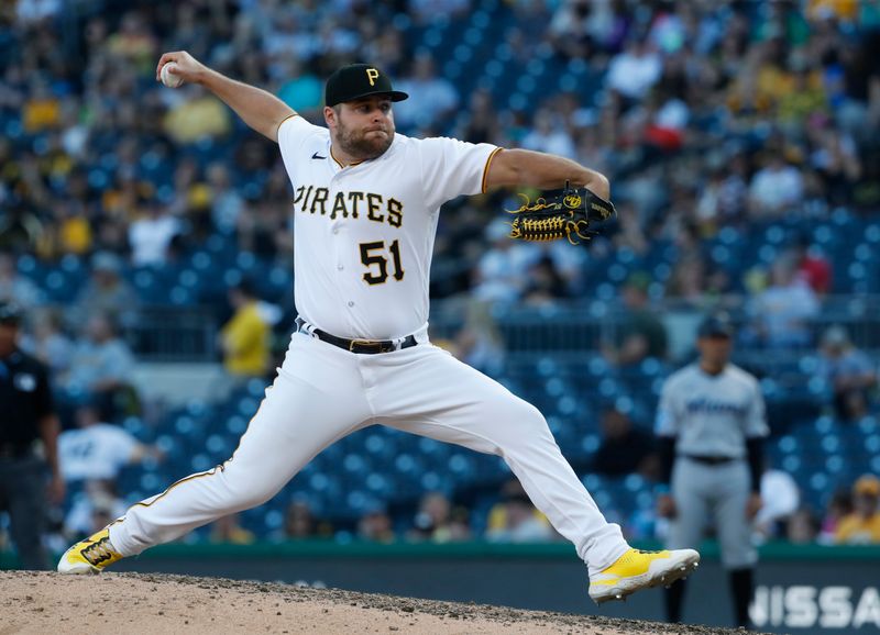 Oct 1, 2023; Pittsburgh, Pennsylvania, USA;  Pittsburgh Pirates relief pitcher David Bednar (51) pitches against the Miami Marlins during the ninth inning at PNC Park. Pittsburgh won 3-0. Mandatory Credit: Charles LeClaire-USA TODAY Sports