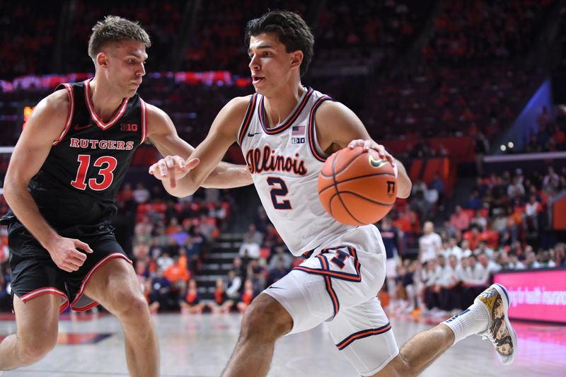 Jan 8, 2026; Champaign, Illinois, USA;  Illinois Fighting Illini guard Andrej Stojakovic (2) drives the ball past Rutgers Scarlet Knights guard Harun Zrno (13) during the first half at State Farm Center. Mandatory Credit: Ron Johnson-Imagn Images
