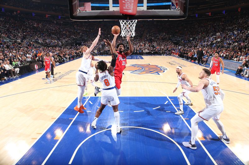 NEW YORK, NY - APRIL 20:  Joel Embiid #21 of the Philadelphia 76ers goes to the basket during the game against the New York Knicks during Round 1 Game 1 of the 2024 NBA Playoffs on April 20, 2024 at Madison Square Garden in New York City, New York.  NOTE TO USER: User expressly acknowledges and agrees that, by downloading and or using this photograph, User is consenting to the terms and conditions of the Getty Images License Agreement. Mandatory Copyright Notice: Copyright 2024 NBAE  (Photo by Nathaniel S. Butler/NBAE via Getty Images)