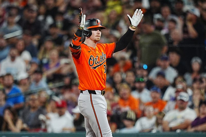 Aug 31, 2024; Denver, Colorado, USA; Baltimore Orioles first base Ryan O'Hearn (32) celebrates his two run single in the fifth inning against the Colorado Rockies at Coors Field. Mandatory Credit: Ron Chenoy-USA TODAY Sports