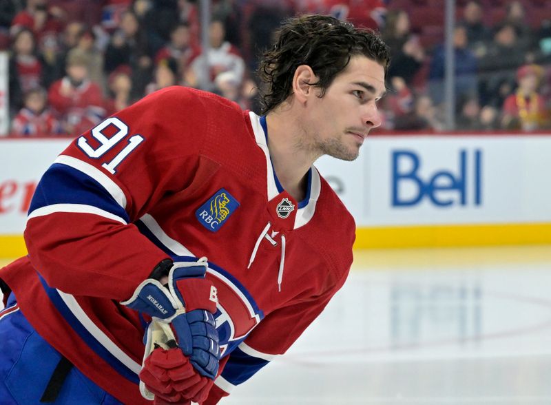 Dec 4, 2023; Montreal, Quebec, CAN; Montreal Canadiens forward Sean Monahan (91) skates during the warmup period before the game against the Seattle Kraken at the Bell Centre. Mandatory Credit: Eric Bolte-USA TODAY Sports