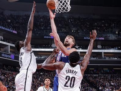 SACRAMENTO, CA - DECEMBER 11: Domantas Sabonis #10 of the Sacramento Kings drives to the basket during the game against the Brooklyn Nets on December 11, 2023 at Golden 1 Center in Sacramento, California. NOTE TO USER: User expressly acknowledges and agrees that, by downloading and or using this Photograph, user is consenting to the terms and conditions of the Getty Images License Agreement. Mandatory Copyright Notice: Copyright 2023 NBAE (Photo by Rocky Widner/NBAE via Getty Images)