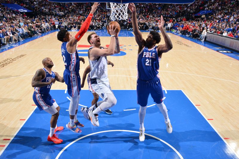 PHILADELPHIA, PA - MARCH 29: Luka Doncic #77 of the Dallas Mavericks shoots the ball during the game against the Philadelphia 76ers on March 29, 2023 at the Wells Fargo Center in Philadelphia, Pennsylvania NOTE TO USER: User expressly acknowledges and agrees that, by downloading and/or using this Photograph, user is consenting to the terms and conditions of the Getty Images License Agreement. Mandatory Copyright Notice: Copyright 2023 NBAE (Photo by Jesse D. Garrabrant/NBAE via Getty Images)