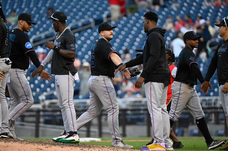 Sep 2, 2023; Washington, District of Columbia, USA; Miami Marlins third baseman Jake Burger (36) celebrates with teammates after the game against the Washington Nationals at Nationals Park. Mandatory Credit: Brad Mills-USA TODAY Sports