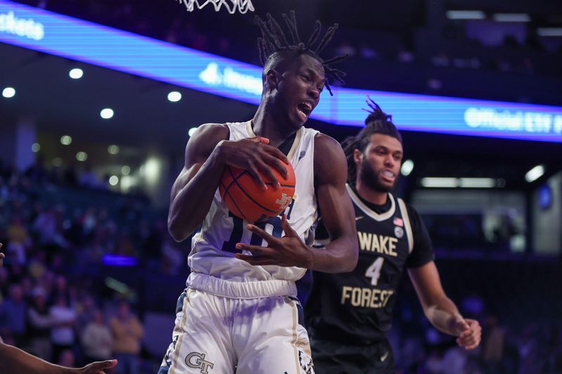 Feb 6, 2024; Atlanta, Georgia, USA; Georgia Tech Yellow Jackets forward Ebenezer Dowuona (10) grabs a rebound against the Wake Forest Demon Deacons in the first half at McCamish Pavilion. Mandatory Credit: Brett Davis-USA TODAY Sports
