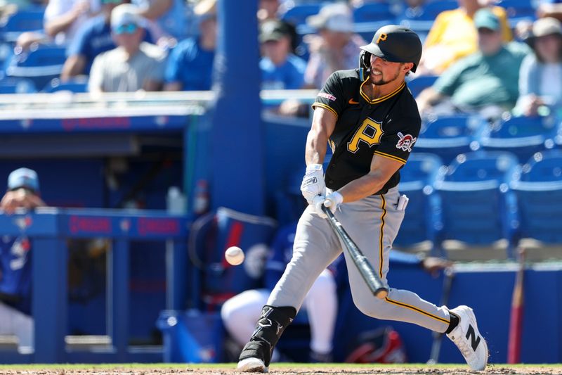 Mar 6, 2026; Dunedin, Florida, USA; Pittsburgh Pirates right fielder Dominic Fletcher (26) hits a home run against the Toronto Blue Jays in the fourth inning during spring training at TD Ballpark. Mandatory Credit: Nathan Ray Seebeck-Imagn Images
