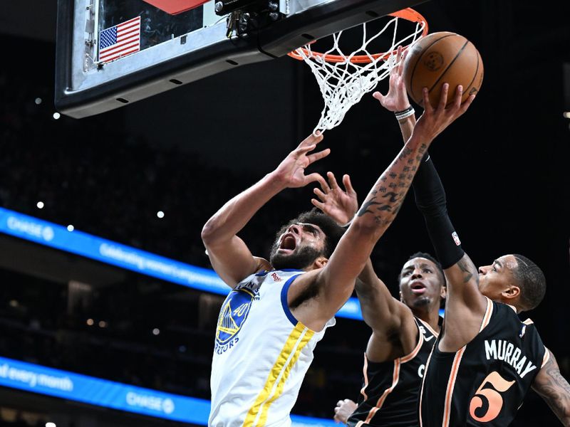 ATLANTA, GA - MARCH 17: Anthony Lamb #40 of the Golden State Warriors drives to the basket during the game against the Atlanta Hawks on March 17, 2023 at State Farm Arena in Atlanta, Georgia.  NOTE TO USER: User expressly acknowledges and agrees that, by downloading and/or using this Photograph, user is consenting to the terms and conditions of the Getty Images License Agreement. Mandatory Copyright Notice: Copyright 2023 NBAE (Photo by Adam Hagy/NBAE via Getty Images)