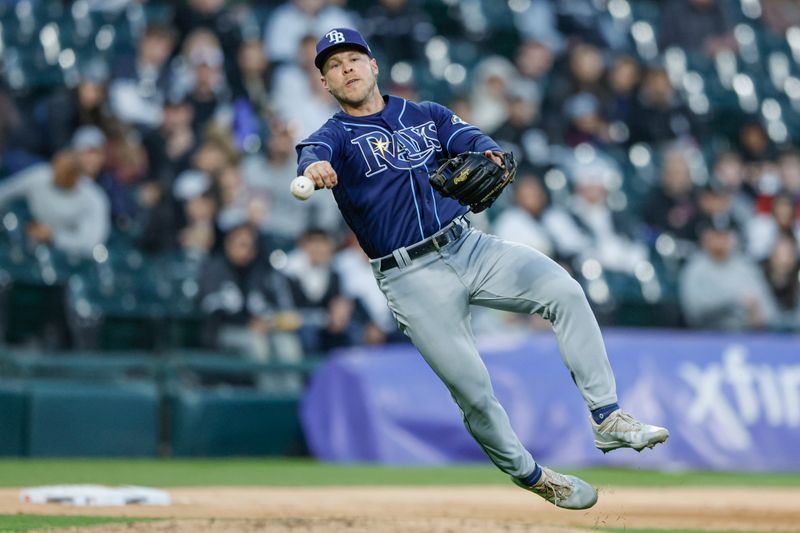 Apr 28, 2023; Chicago, Illinois, USA; Tampa Bay Rays second baseman Taylor Walls (6) throws to first base for a Chicago White Sox out during the fifth inning at Guaranteed Rate Field. Mandatory Credit: Kamil Krzaczynski-USA TODAY Sports