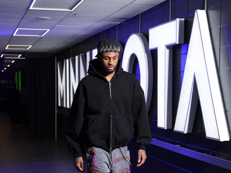 MINNEAPOLIS, MN -  MARCH 31: Nickeil Alexander-Walker #9 of the Minnesota Timberwolves arrives to the arena before the game against the Chicago Bulls on March 31, 2024 at Target Center in Minneapolis, Minnesota. NOTE TO USER: User expressly acknowledges and agrees that, by downloading and or using this Photograph, user is consenting to the terms and conditions of the Getty Images License Agreement. Mandatory Copyright Notice: Copyright 2024 NBAE (Photo by David Sherman/NBAE via Getty Images)