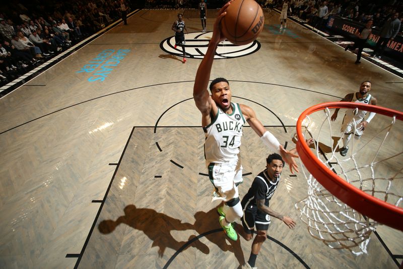 BROOKLYN, NY - DECEMBER 8: Giannis Antetokounmpo #34 of the Milwaukee Bucks dunks the ball during the game against the Brooklyn Nets on December 8, 2024 at Barclays Center in Brooklyn, New York. NOTE TO USER: User expressly acknowledges and agrees that, by downloading and or using this Photograph, user is consenting to the terms and conditions of the Getty Images License Agreement. Mandatory Copyright Notice: Copyright 2024 NBAE (Photo by Nathaniel S. Butler/NBAE via Getty Images)