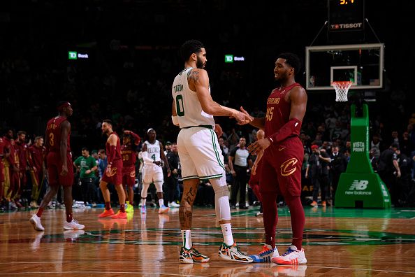 BOSTON, MA - DECEMBER 14: Jayson Tatum #0 of the Boston Celtics talks with Donovan Mitchell #45 of the Cleveland Cavaliers after the game on December 14, 2023 at the TD Garden in Boston, Massachusetts. NOTE TO USER: User expressly acknowledges and agrees that, by downloading and or using this photograph, User is consenting to the terms and conditions of the Getty Images License Agreement. Mandatory Copyright Notice: Copyright 2023 NBAE  (Photo by Brian Babineau/NBAE via Getty Images)